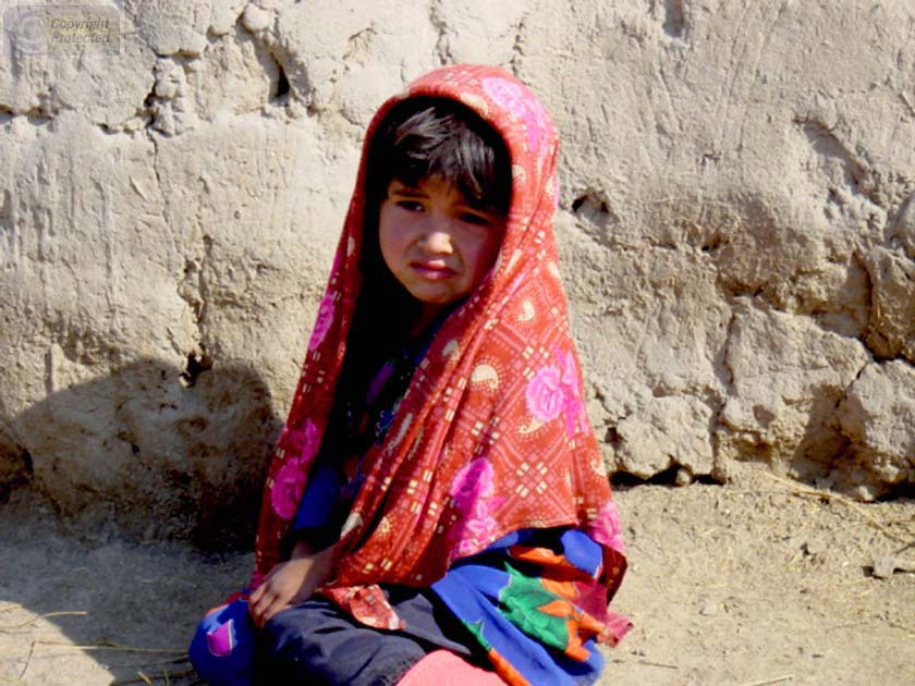 Little Girl sitting Alone